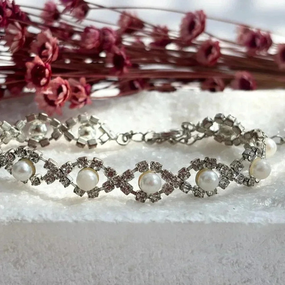 Vintage Silver Toned Faux Pearly Eyes Accent Rhinestone Crossover Bracelet - Picture 1 of 9